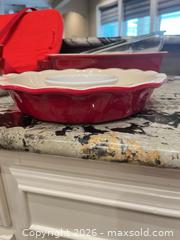 MaxSold Auction: Mixed Red Ceramic & Glass Bakeware Set with Carrying Bag - Frisco (Texas, USA) PARTNER MANAGED Downsizing Online Auction - Miramar Drive
