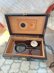 MaxSold Auction: Small Lacquered Wood Humidor with Hygrometer - Frisco (Texas, USA) PARTNER MANAGED Downsizing Online Auction - Miramar Drive