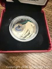 MaxSold Auction: 2015 $10 Fine Silver Vancouver Canucks Hockey Coin - Cambridge (Ontario, Canada) SELLER MANAGED Downsizing Online Auction - Mcnichol Drive