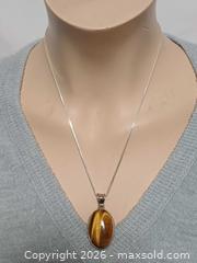 MaxSold Auction: 925 Silver & Tiger's Eye Pendant Neclace Marked  - Toronto (Ontario, Canada) PARTNER MANAGED Reseller Online Auction - Queen Street West