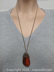 MaxSold Auction: Nature Baltic Amber & Silver Pendant Necklace  - Toronto (Ontario, Canada) PARTNER MANAGED Reseller Online Auction - Queen Street West