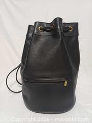 MaxSold Auction: Rare Vintage Roots Canada Large Black Leather Crossbody Bucket Bag - Toronto (Ontario, Canada) PARTNER MANAGED Reseller Online Auction - Queen Street West