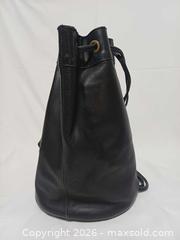 MaxSold Auction: Rare Vintage Roots Canada Large Black Leather Crossbody Bucket Bag - Toronto (Ontario, Canada) PARTNER MANAGED Reseller Online Auction - Queen Street West