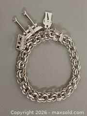 MaxSold Auction: Vintage 925 Sterling Silver Charms Bracelet Marked  - Toronto (Ontario, Canada) PARTNER MANAGED Reseller Online Auction - Queen Street West
