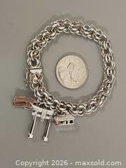 MaxSold Auction: Vintage 925 Sterling Silver Charms Bracelet Marked  - Toronto (Ontario, Canada) PARTNER MANAGED Reseller Online Auction - Queen Street West