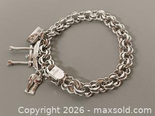 MaxSold Auction: Vintage 925 Sterling Silver Charms Bracelet Marked  - Toronto (Ontario, Canada) PARTNER MANAGED Reseller Online Auction - Queen Street West