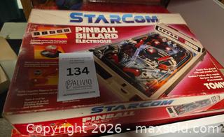 MaxSold Auction: 1980s Vintage Tomy Starcom Electronic Tabletop Pinball Machine, complete with its original box - Toronto (Ontario, Canada) PARTNER MANAGED Downsizing Online Auction - Batavia Avenue
