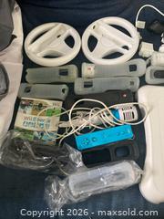 MaxSold Auction: Nintendo Wii console bundle - Toronto (Ontario, Canada) PARTNER MANAGED Downsizing Online Auction - Batavia Avenue