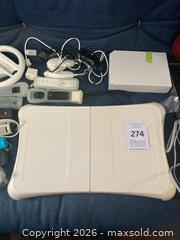 MaxSold Auction: Nintendo Wii console bundle - Toronto (Ontario, Canada) PARTNER MANAGED Downsizing Online Auction - Batavia Avenue