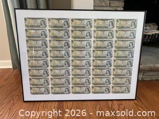 MaxSold Auction: Uncut sheet of one dollar Canadian bills.  - Richmond Hill (Ontario, Canada) SELLER MANAGED Downsizing Online Auction - Laverock Avenue