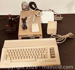 MaxSold Auction: Commodore 64 Home Computer System with a 1541 Disk Drive and Joystick (as is)  - Newmarket (Ontario, Canada) PARTNER MANAGED Reseller Online Auction - Walter Avenue