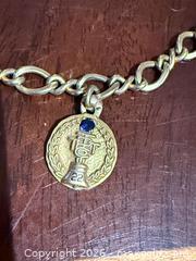 MaxSold Auction: 7-inch 10K/12K Gold Bracelet with Coin Charm, Blue Stone - Brampton (Ontario, Canada) SELLER MANAGED Charity/Fundraising Online Auction -  Pine Ridge Lane
