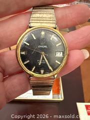 MaxSold Auction: Enicar Automatic Gold-Plated Watch with Black Dial - Brampton (Ontario, Canada) SELLER MANAGED Charity/Fundraising Online Auction -  Pine Ridge Lane