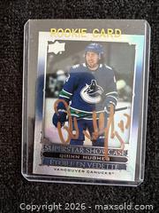MaxSold Auction: (2) QUINN HUGHES AUTOGRAPHED HOCKEY CARDS - Vancouver (British Columbia, Canada) SELLER MANAGED Reseller Online Auction - West Broadway