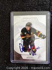 MaxSold Auction: (2) QUINN HUGHES AUTOGRAPHED HOCKEY CARDS - Vancouver (British Columbia, Canada) SELLER MANAGED Reseller Online Auction - West Broadway