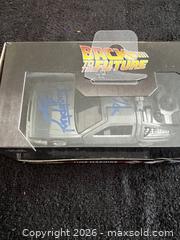 MaxSold Auction: MICHAEL J. FOX & CHRISTOPHER LLOYD AUTOGRAPHED "BACK TO THE FUTURE DELOREAN" W/COA - Vancouver (British Columbia, Canada) SELLER MANAGED Reseller Online Auction - West Broadway
