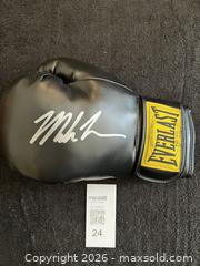 MaxSold Auction: MIKE TYSON AUTOGRAPHED BLACK EVERLAST BOXING GLOVE W/COA - Vancouver (British Columbia, Canada) SELLER MANAGED Reseller Online Auction - West Broadway