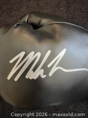 MaxSold Auction: MIKE TYSON AUTOGRAPHED BLACK EVERLAST BOXING GLOVE W/COA - Vancouver (British Columbia, Canada) SELLER MANAGED Reseller Online Auction - West Broadway