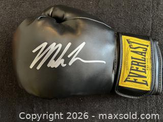 MaxSold Auction: MIKE TYSON AUTOGRAPHED BLACK EVERLAST BOXING GLOVE W/COA - Vancouver (British Columbia, Canada) SELLER MANAGED Reseller Online Auction - West Broadway