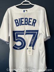 MaxSold Auction: SHANE BIEBER AUTOGRAPHED TORONTO BLUE JAYS JERSEY W/COA - Vancouver (British Columbia, Canada) SELLER MANAGED Reseller Online Auction - West Broadway