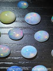 MaxSold Auction: Big collectors lot Untreated Ethiopian opal  - Toronto (Ontario, Canada) PARTNER MANAGED Reseller Online Auction - Gerrard Street East