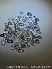 MaxSold Auction: Rare untreated Exotic Tanzanite lot  - Toronto (Ontario, Canada) PARTNER MANAGED Reseller Online Auction - Gerrard Street East