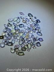 MaxSold Auction: Rare untreated Exotic Tanzanite lot  - Toronto (Ontario, Canada) PARTNER MANAGED Reseller Online Auction - Gerrard Street East