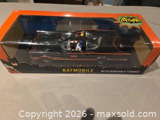 MaxSold Auction: Batman 1960s Batmobile Diecast with Bendable Batman & Robin - Hamilton (Ontario, Canada) SELLER MANAGED Downsizing Online Auction - Alderney Avenue