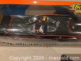 MaxSold Auction: Batman 1960s Batmobile Diecast with Bendable Batman & Robin - Hamilton (Ontario, Canada) SELLER MANAGED Downsizing Online Auction - Alderney Avenue