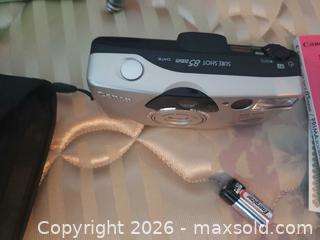 MaxSold Auction: Canon (Film) Camera with Tripod + - Langley (British Columbia, Canada) PARTNER MANAGED Moving Online Auction - 46a Avenue