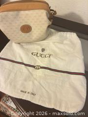 MaxSold Auction: Gucci Small Beige Tan Canvas and Leather Crossbody Bag - Mckinney (Texas, USA) SELLER MANAGED Downsizing Online Auction -  Pelican Hills Drive