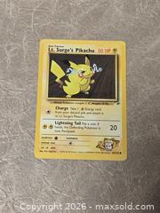 MaxSold Auction: Pokemon Lt Surge Pikachus 81/132 & 84/132 Cards Lot of 2 LP - Toronto (Ontario, Canada) PARTNER MANAGED Downsizing Online Auction - Mcadam Avenue
