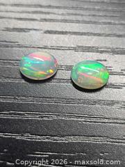MaxSold Auction: Amazing AAA crystal Jelly opal pair  - Hamilton (Ontario, Canada) PARTNER MANAGED Reseller Online Auction - Brentwood Drive