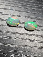 MaxSold Auction: Amazing AAA crystal Jelly opal pair  - Hamilton (Ontario, Canada) PARTNER MANAGED Reseller Online Auction - Brentwood Drive