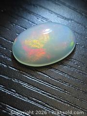 MaxSold Auction: Gorgeous big AAA Jelly opal - Hamilton (Ontario, Canada) PARTNER MANAGED Reseller Online Auction - Brentwood Drive