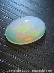 MaxSold Auction: Gorgeous big AAA Jelly opal - Hamilton (Ontario, Canada) PARTNER MANAGED Reseller Online Auction - Brentwood Drive