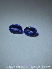 MaxSold Auction: Natural flawless Tanzanite pair  - Hamilton (Ontario, Canada) PARTNER MANAGED Reseller Online Auction - Brentwood Drive