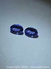 MaxSold Auction: Natural flawless Tanzanite pair  - Hamilton (Ontario, Canada) PARTNER MANAGED Reseller Online Auction - Brentwood Drive