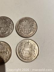 MaxSold Auction: Four Canadian 50 Cent Coins 1950–1956 Silver (pre-1967) - Ancaster (Ontario, Canada) SELLER MANAGED Downsizing Online Auction -  Galley Road