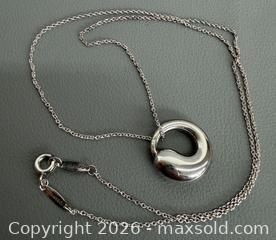 MaxSold Auction: 925 Silver Tiffany & Co. Elsa Peretti Eternal Circle Necklace in Original Packaging - Marked  - Toronto (Ontario, Canada) PARTNER MANAGED Reseller Online Auction - Queen Street West.