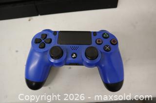 MaxSold Auction: Sony PS4 500GB Console with Blue DualShock & Cables - Toronto (Ontario, Canada) SELLER MANAGED Downsizing Online Auction - Danforth Avenue