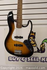 MaxSold Auction: Squier J-Style 4-String Electric Bass Guitar, Sunburst - Toronto (Ontario, Canada) SELLER MANAGED Downsizing Online Auction - Danforth Avenue