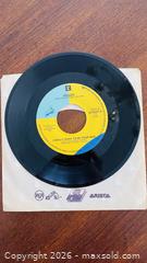MaxSold Auction: Roger 7-inch 45 RPM Vinyl Single on Reprise (1980s) - Halton Hills (Ontario, Canada) SELLER MANAGED Downsizing Online Auction - Market Street
