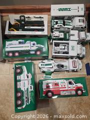 MaxSold Auction: Hess Toy Truck & Vehicle Lot with Helicopter/Plane, Green/White - Sykesville (Maryland, USA) SELLER MANAGED Moving Online Auction - Streaker Road