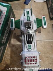 MaxSold Auction: Hess Toy Truck & Vehicle Lot with Helicopter/Plane, Green/White - Sykesville (Maryland, USA) SELLER MANAGED Moving Online Auction - Streaker Road