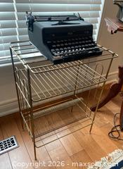 MaxSold Auction: Mid-Century Modern Wire Record Holder / Album Rack Stand - Caledon (Ontario, Canada) SELLER MANAGED Downsizing Online Auction - Westchester Boulevard