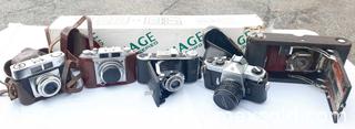 MaxSold Auction: Collection of Vintage Film camera with tripod.  - Ottawa (Ontario, Canada) SELLER MANAGED Moving Online Auction - Coventry Road (STORAGE)
