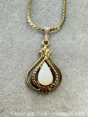 MaxSold Auction: Yellow Gold Tone Teardrop Opal Pendant Necklace, 18 in - San Jose (California, USA) PARTNER MANAGED Estate Sale Online Auction - E Humboldt