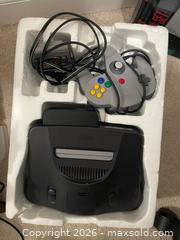 MaxSold Auction: Nintendo 64 (N64) Console with Mario Golf & Controllers - Toronto (Ontario, Canada) SELLER MANAGED Moving Online Auction - Kennedy Road (STORAGE)