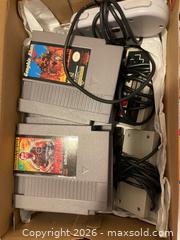 MaxSold Auction: Nintendo NES Cartridge Lot with Wired Controllers - Toronto (Ontario, Canada) SELLER MANAGED Moving Online Auction - Kennedy Road (STORAGE)